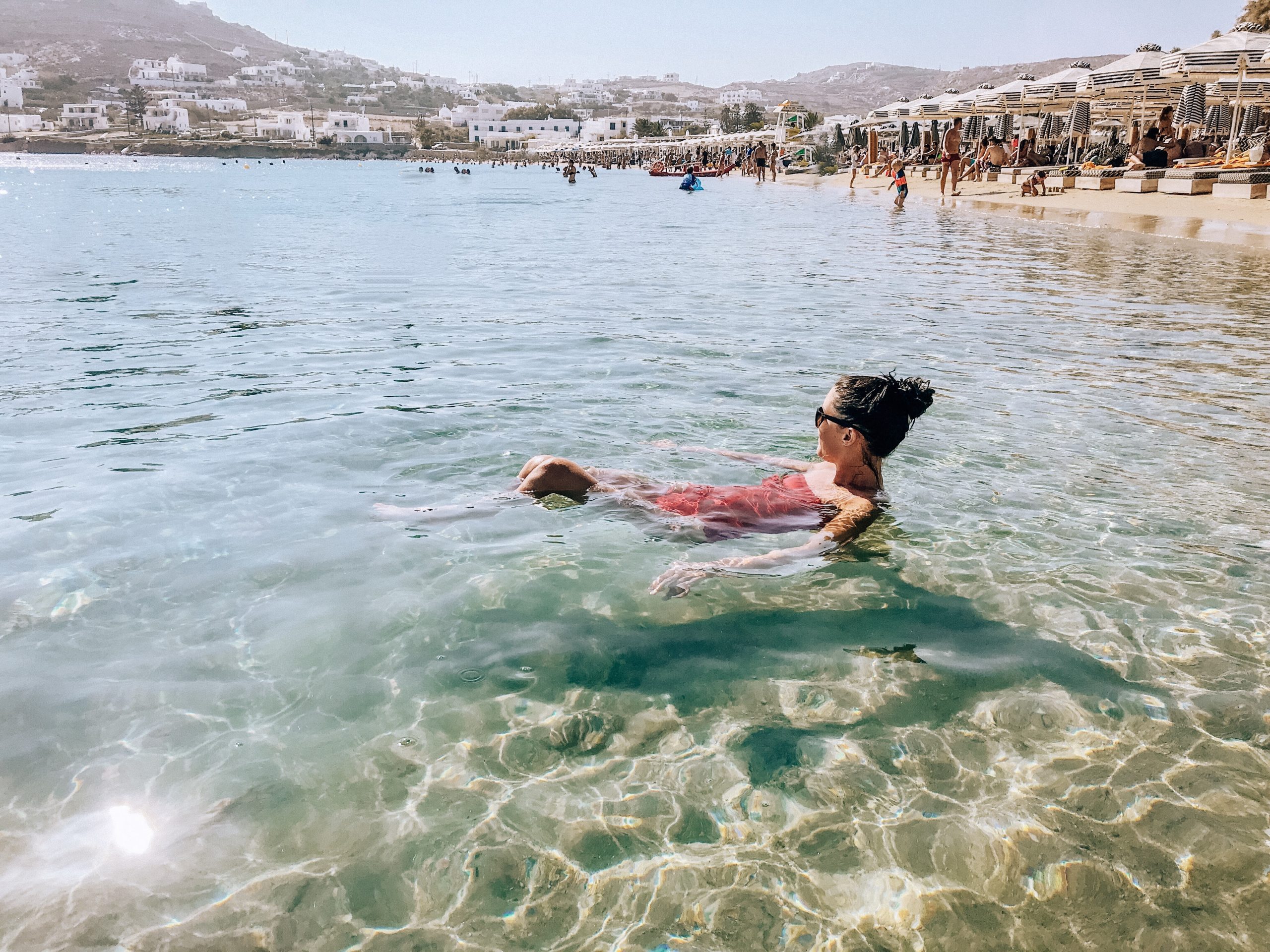 Girl floating in water.