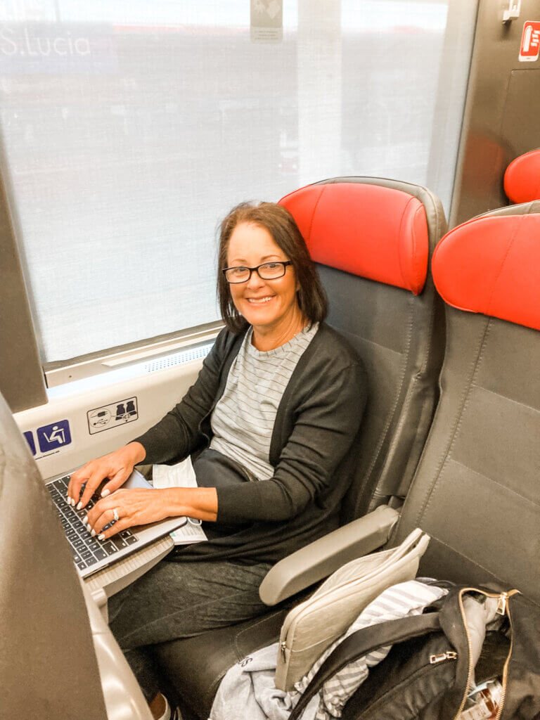 woman sitting on train