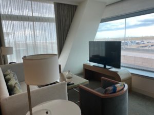 Hotel room with tv in center