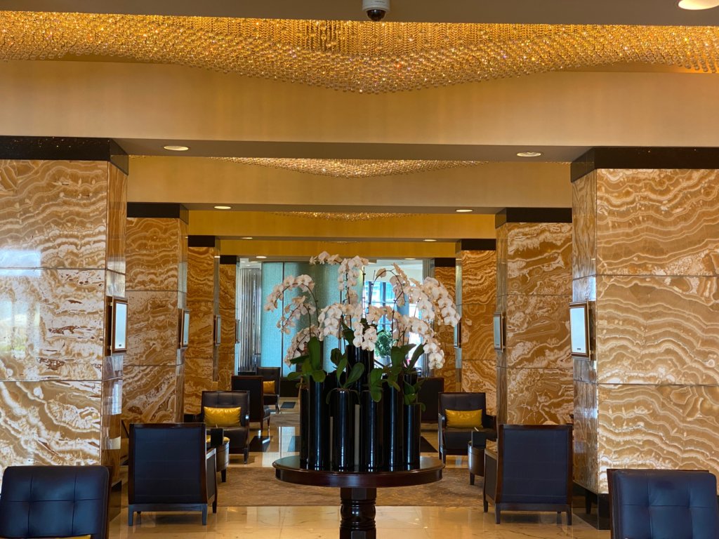 Luxury hotel lobby with chandeliers
