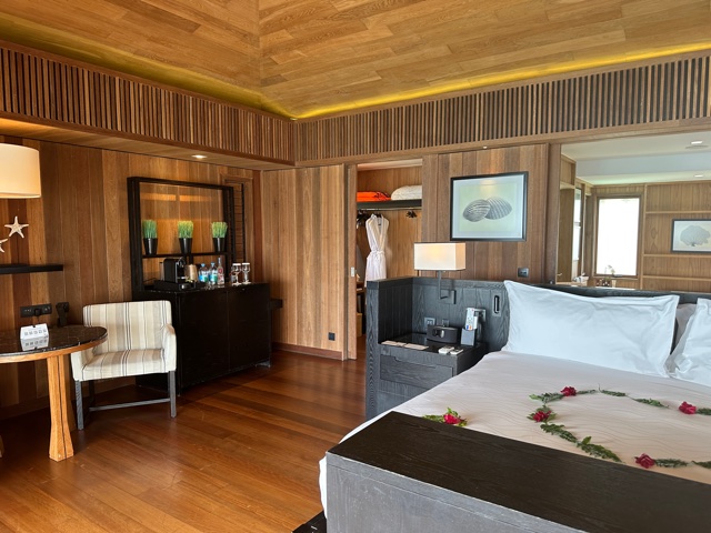 Hotel room with wood paneling