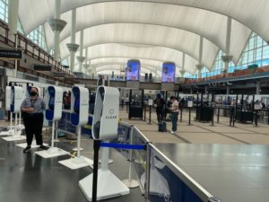 Airport scene with Clear Machines in foreground