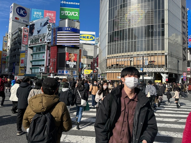 People at crosswalk in Tokyo, Japan.