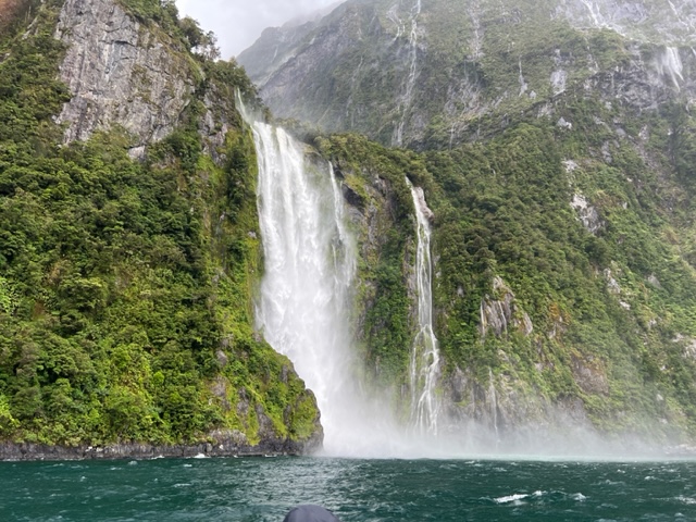 Water falls on high cliffs