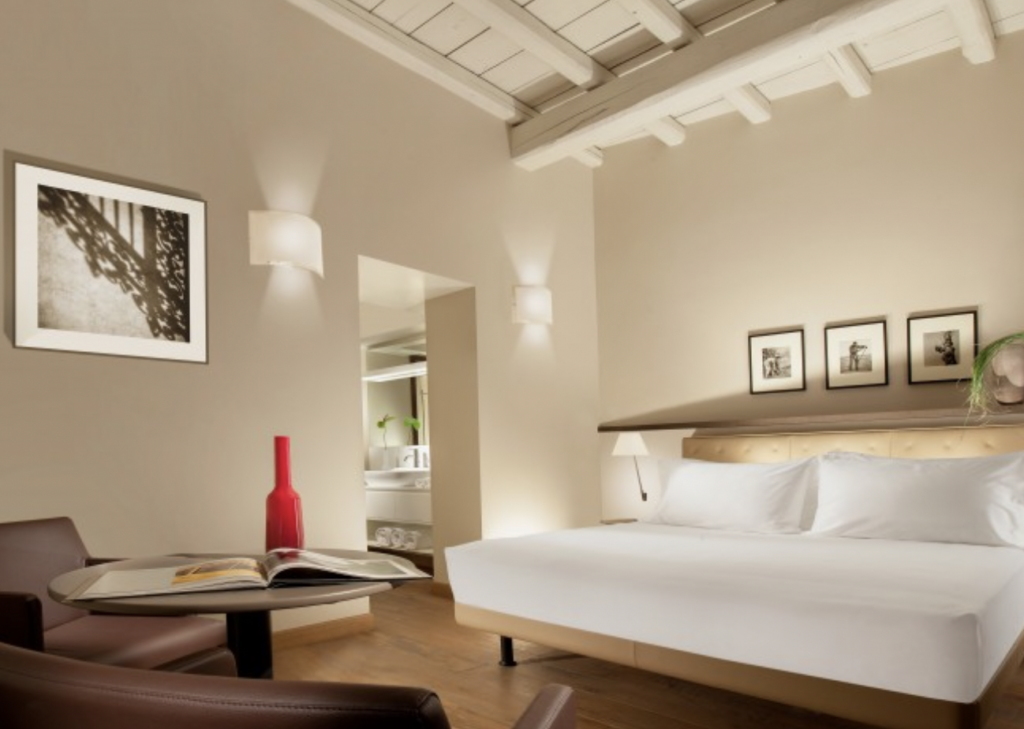 Hotel room with white wood ceiling