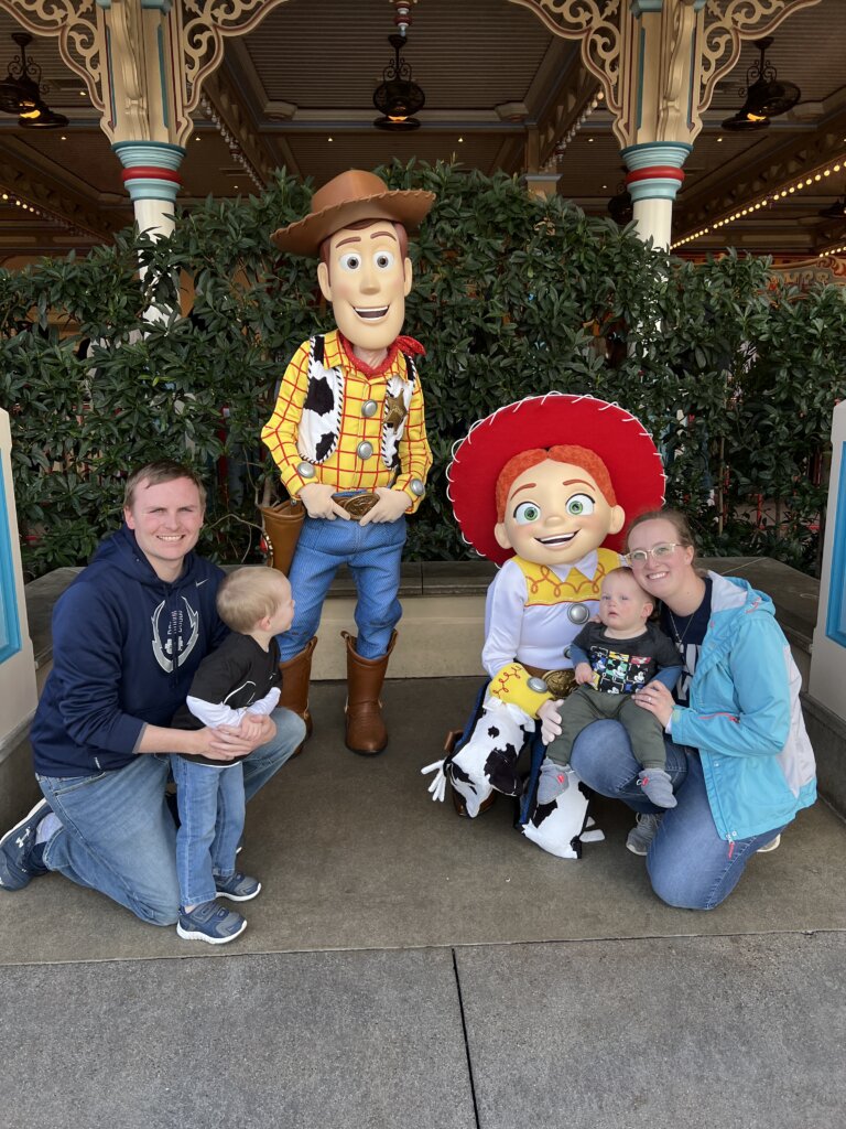 Man, women and two children with cowboy and cowgirl characters.