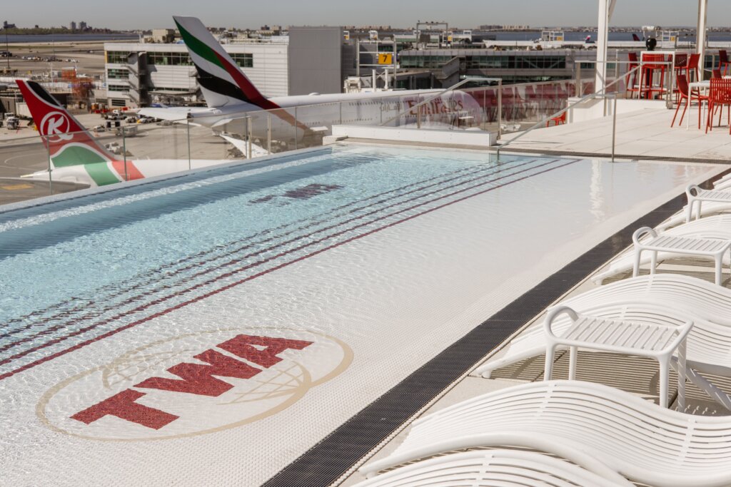 Roof top swimming pool with name TWA by it