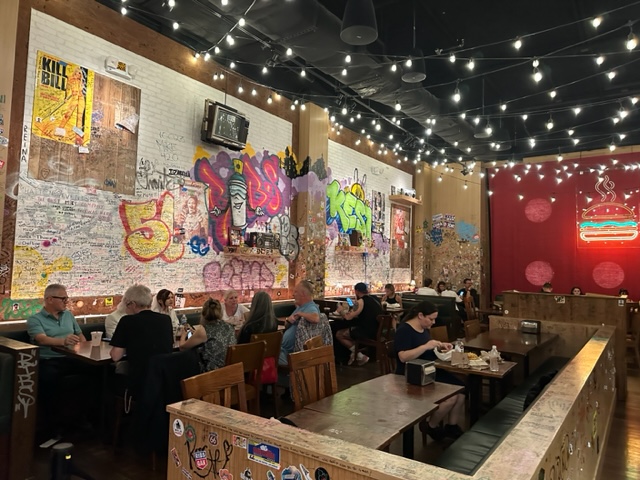 Restaurant with graffiti on walls