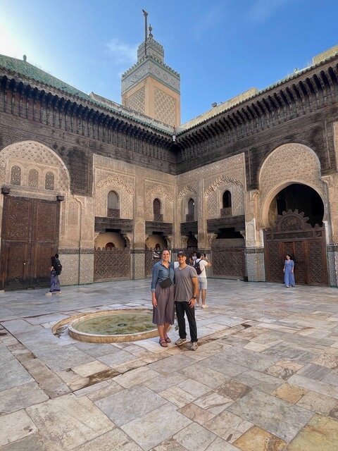 Man and woman standing in courtyard on 10 days in Morocco trip