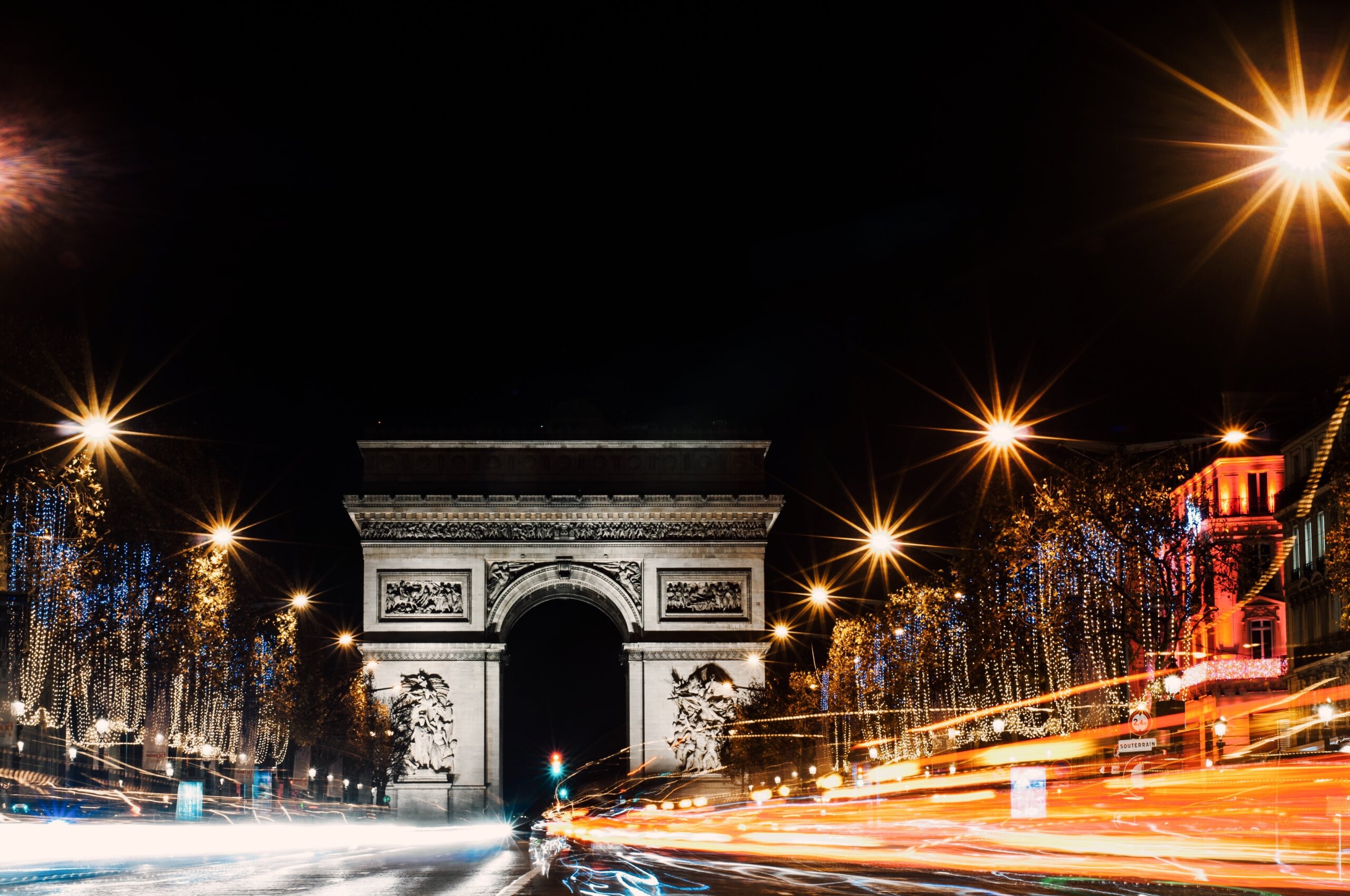 Champs de Elysee at night with Arc de Triomphe