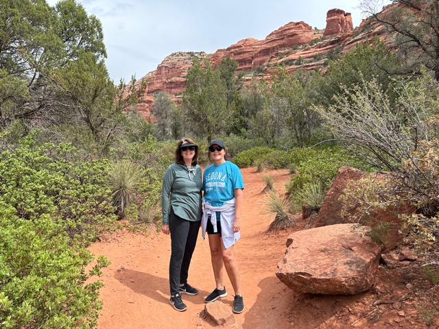 Two women hiking near Red Rocks.