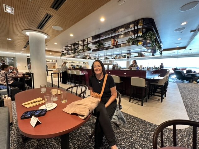 Woman in airport lounge