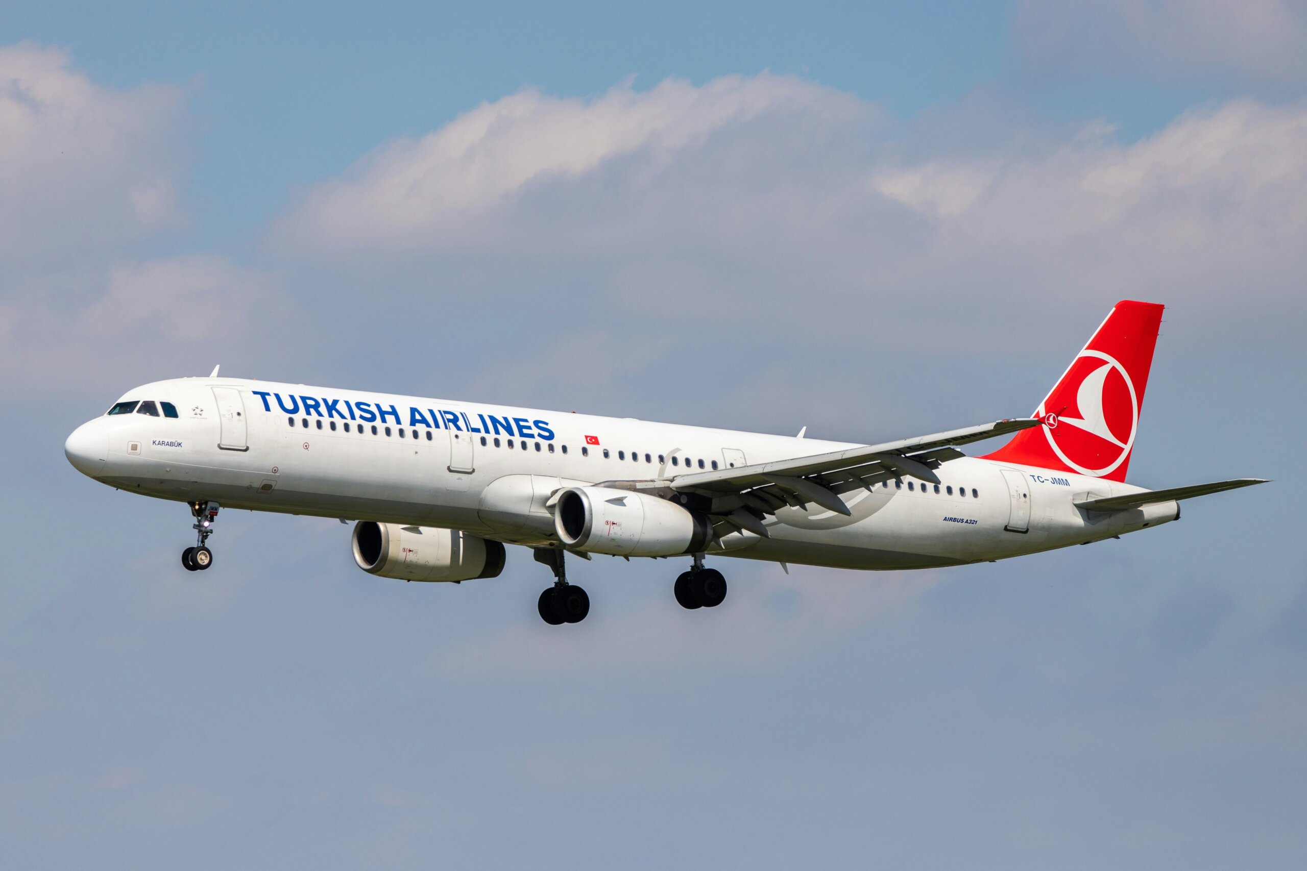 Airline in sky that says Turkish Airlines