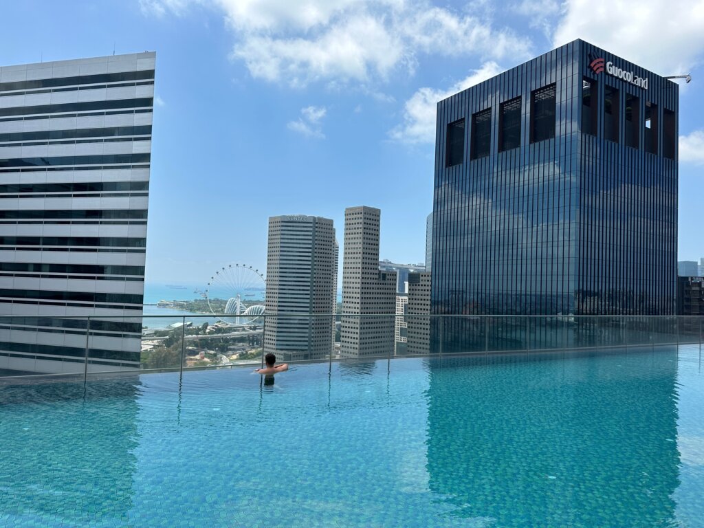 Infinity pool with view of city