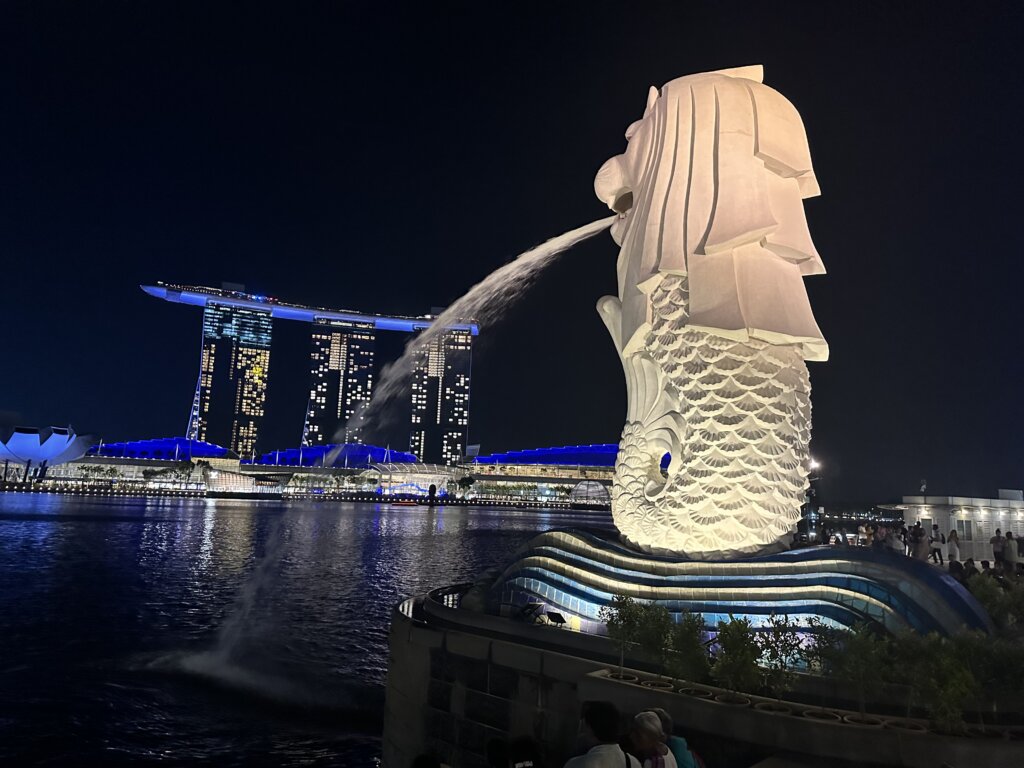 Fountain with large building in background