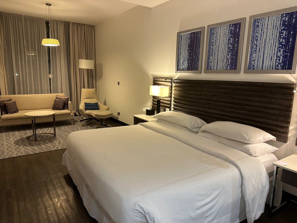 Hotel room with bed and couch