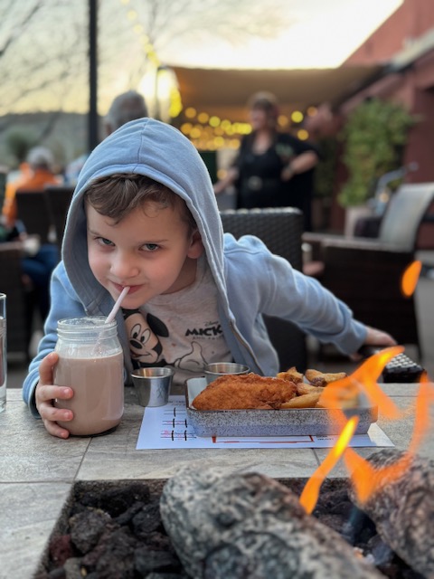 Boy drinking hot chocolate