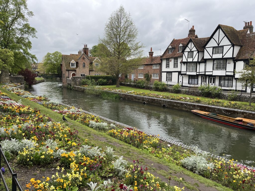 White houses near canal