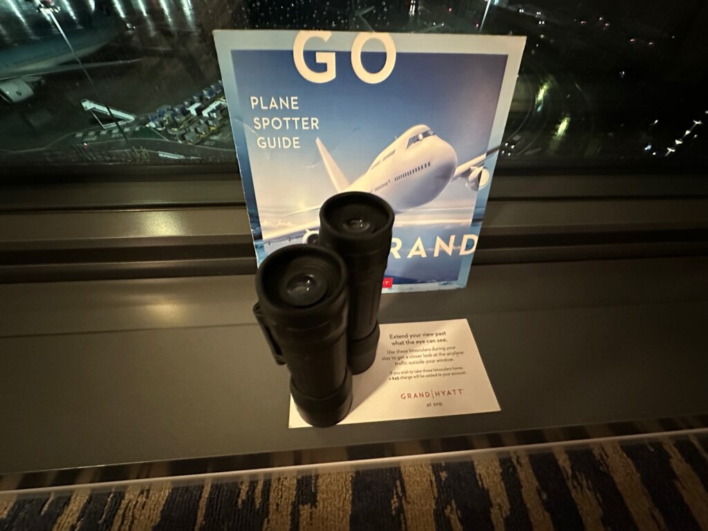 Binoculars with sign