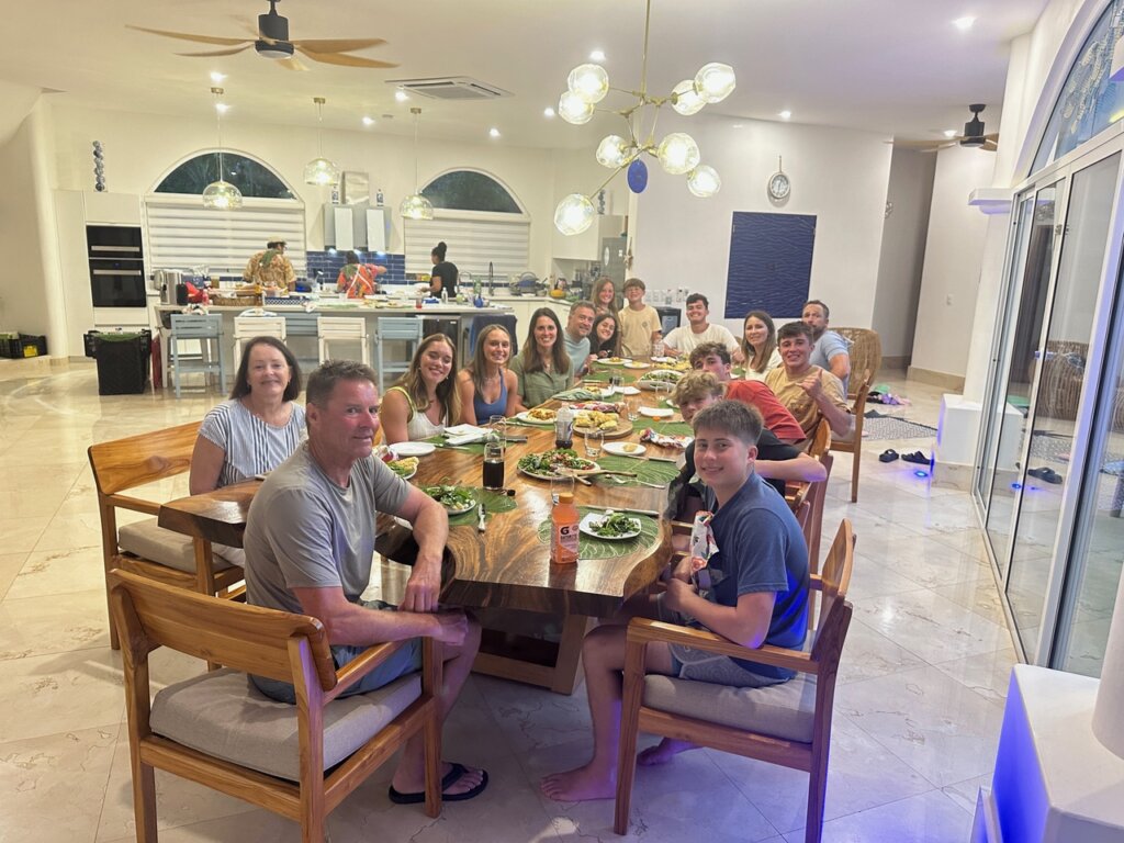 People eating around a large table