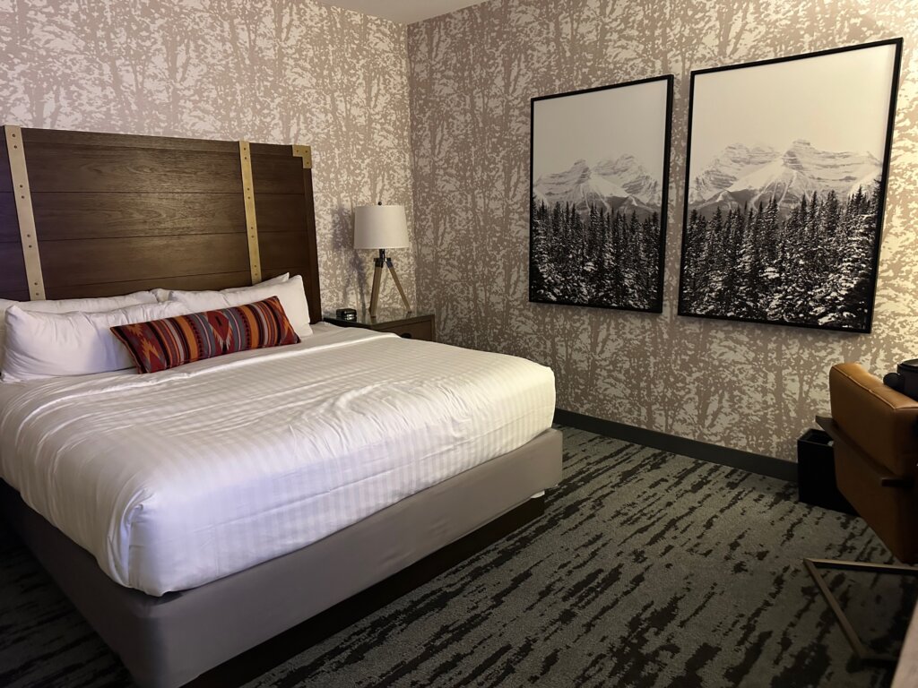 Hotel bedroom with white bed