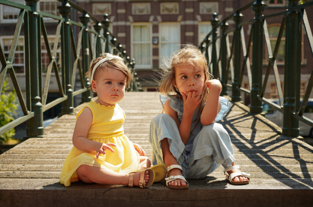 Two girls on bridge