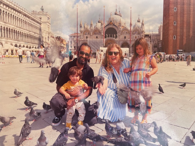 Family in front of palace